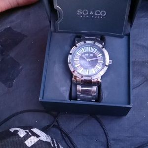 NY SO&CO Madison silver and chrome band with crystals embedded in the bezel.
